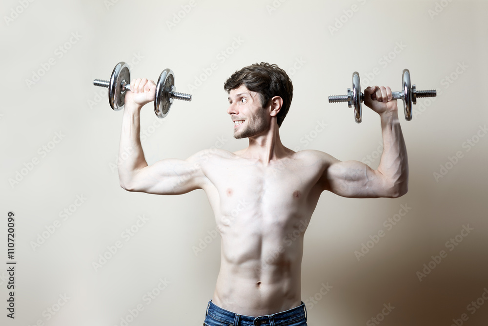 Man lifting dumbbell