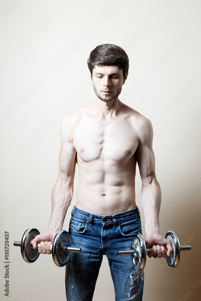 Man lifting dumbbell Man lifting dumbbell