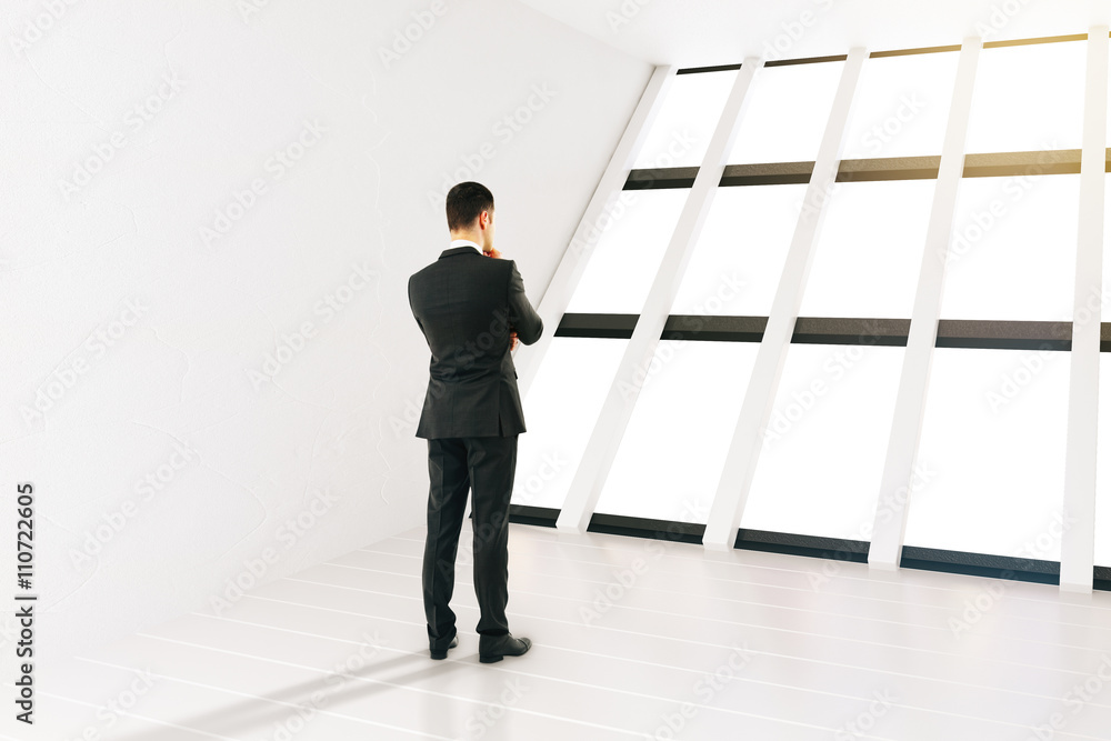 Fototapeta premium Businessman white room