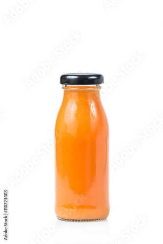 Carrot juice bottle isolated on white background 