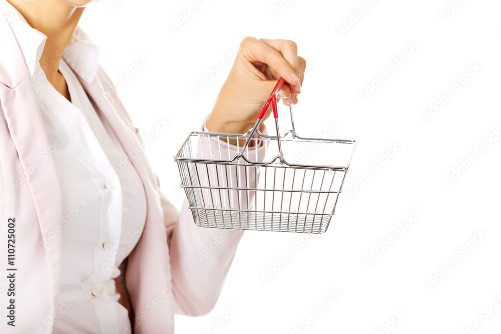 Fototapeta premium Business woman holding small shopping basket