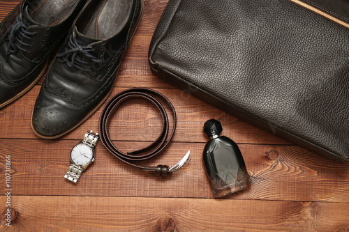 Collection of man's business accessories and clothes.