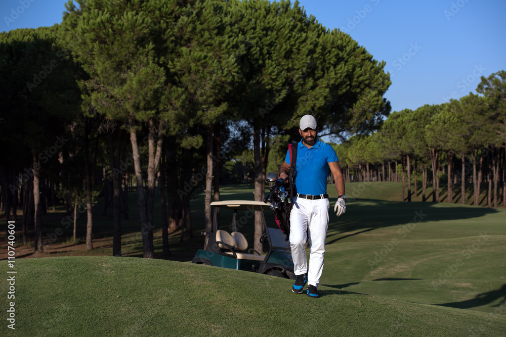 golfer walking and carrying golf bag golfer walking and carrying golf bag