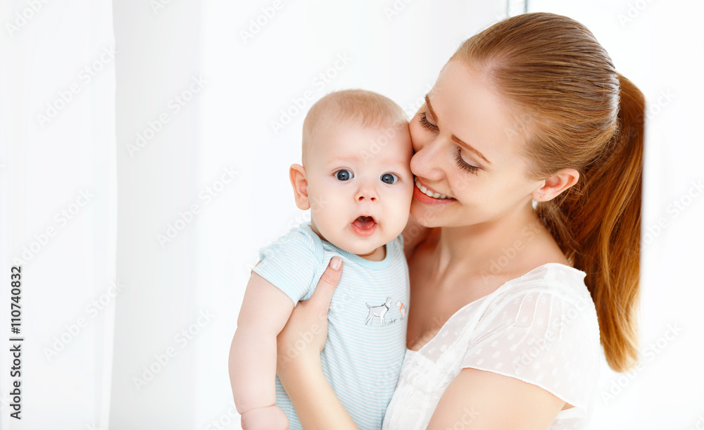 happy family mother playing with baby happy family mother playing with baby