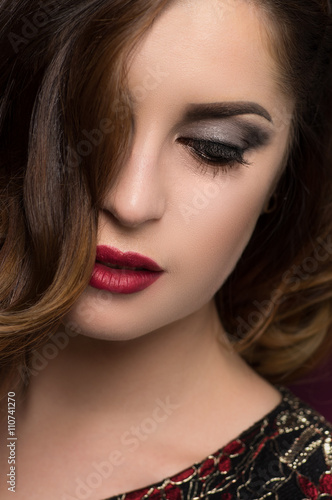 Closeup portrait of beautiful woman with expressive lips