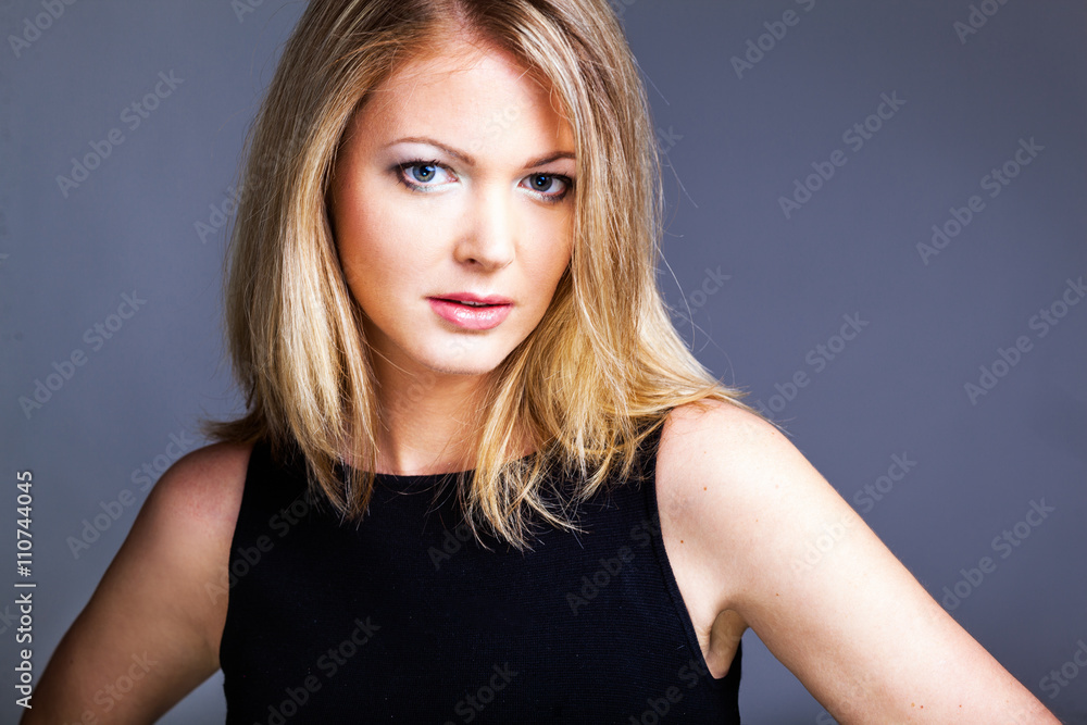 Beautiful woman in black classical dress pose Beautiful woman in black classical dress pose