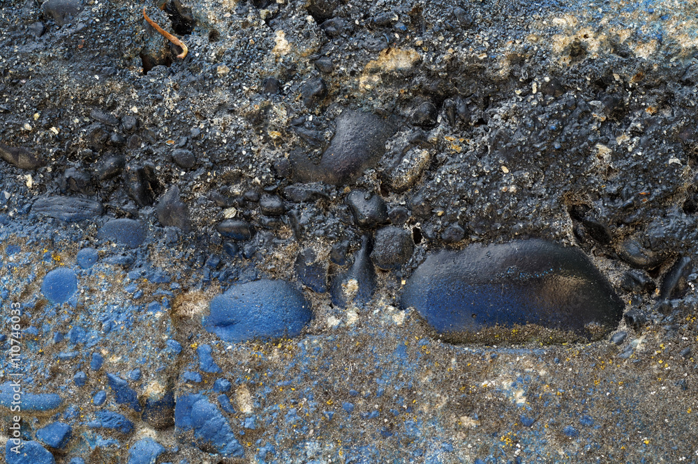 Dirty grey concrete wall with blue colored stones 9 Dirty grey concrete wall with blue colored stones 9