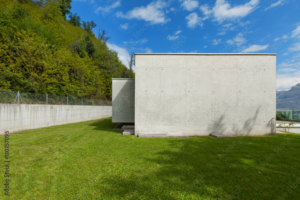 lawn and modern house in cement lawn and modern house in cement