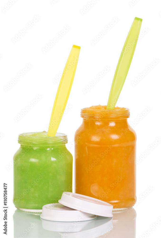 Jars baby puree with vegetables isolated on white background. Jars baby puree with vegetables isolated on white background.