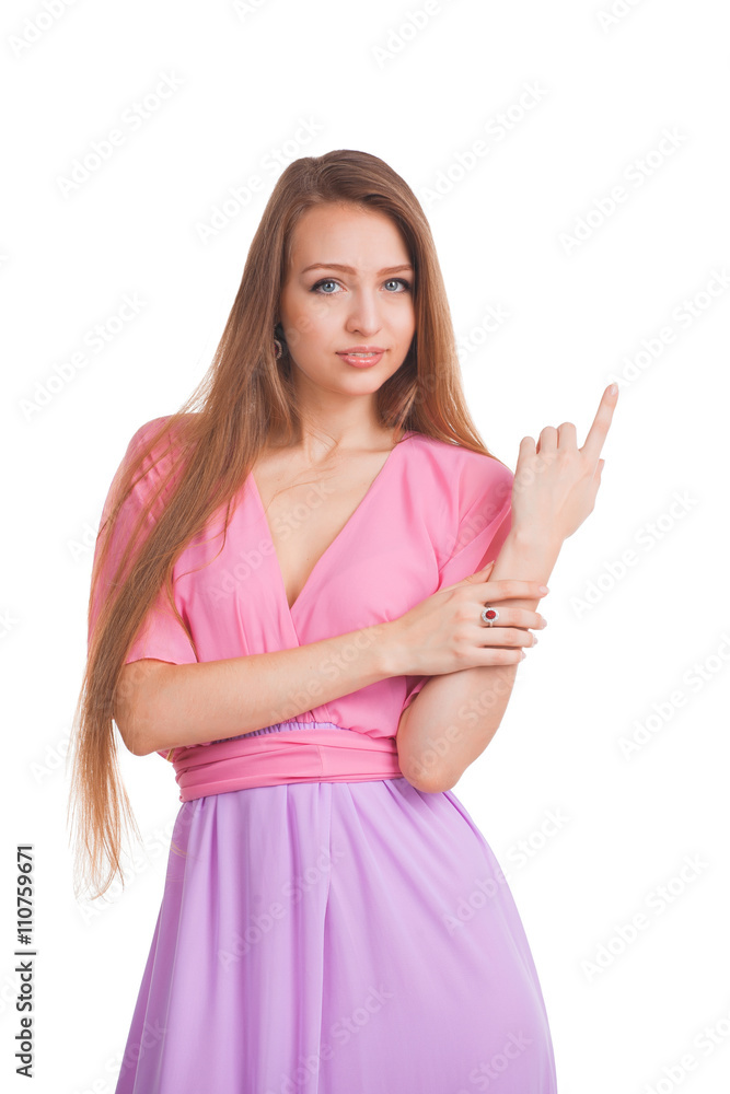 Young beautiful woman posing in dress