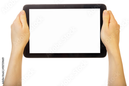 Woman's hands holding digital tablet with blank screen isolated.