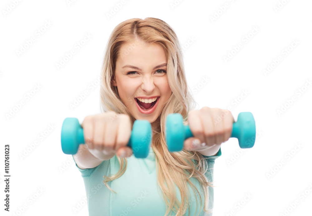 smiling beautiful young sporty woman with dumbbell smiling beautiful young sporty woman with dumbbell
