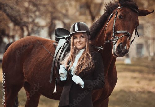 Emotional,happy,kind girl,lady,model with horse.Face,elegant.Closeup,amazing,activity,excellent long day in the horse park.Riding,standing near the mare in special uniform,woman with horse,happy,style