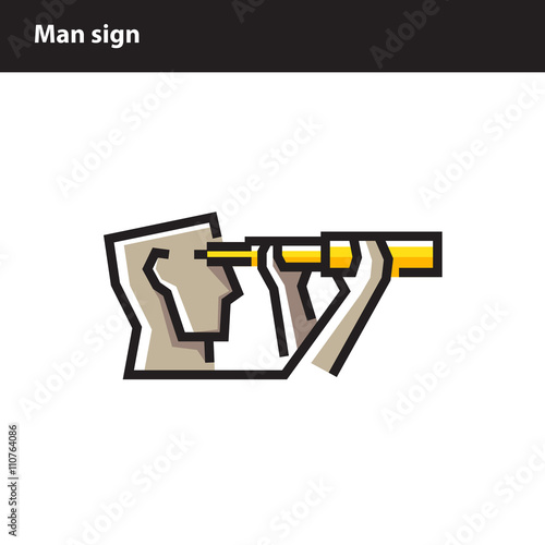 man looks through a telescope
