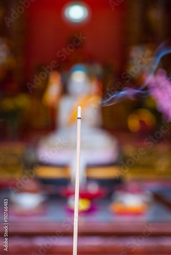 Close-up of incense in temple
