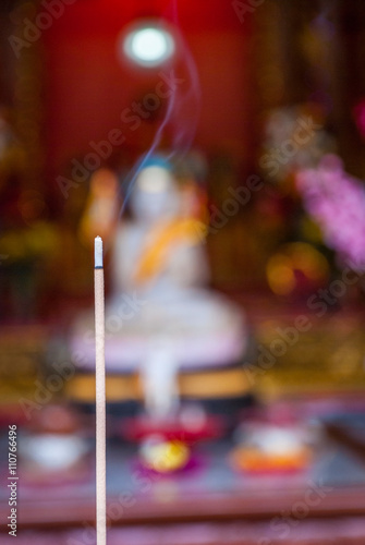 Close-up of incense in temple