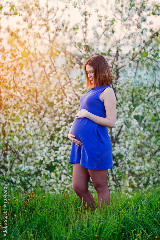 Young happy pregnant woman enjoying life in nature Young happy pregnant woman enjoying life in nature