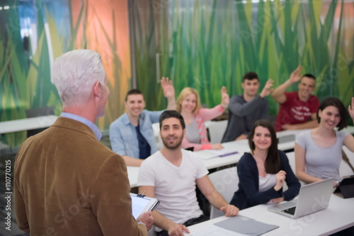 students group raise hands up