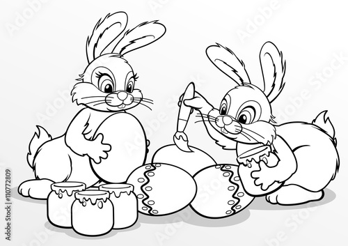 Fototapeta Kolorowanie. Wielkanocne króliczki malują jajka. białe tło