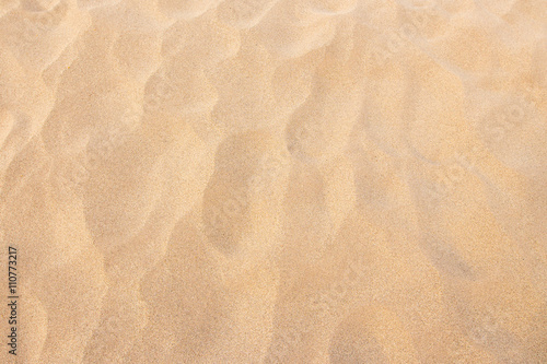 closeup sand texture pattern background of a beach in the summer