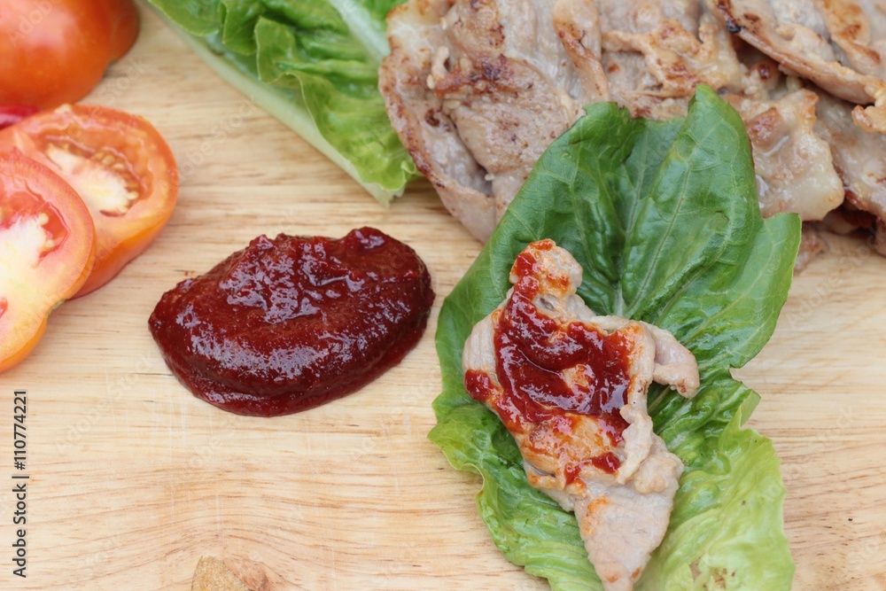 grilled pork korean food with chilli sauce. grilled pork korean food with chilli sauce.