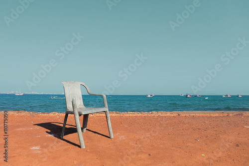 a beautiful chair in front of a nice and relax sea beach view. I took it on my vacation. Love the color of it.