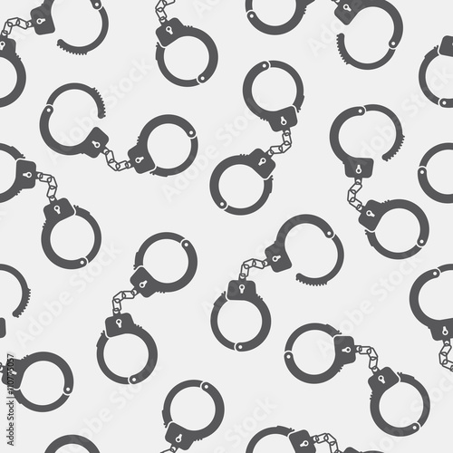Seamless pattern with handcuffs 