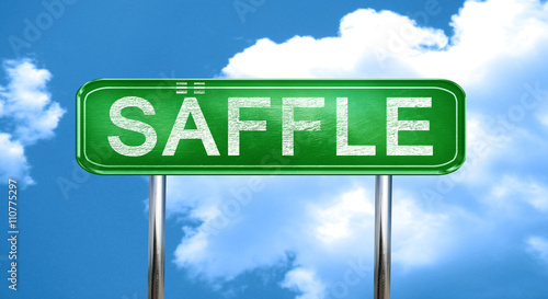 Saffle vintage green road sign with highlights photo