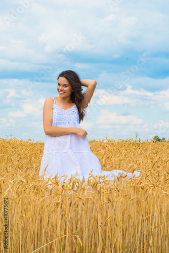 young woman in wheat field