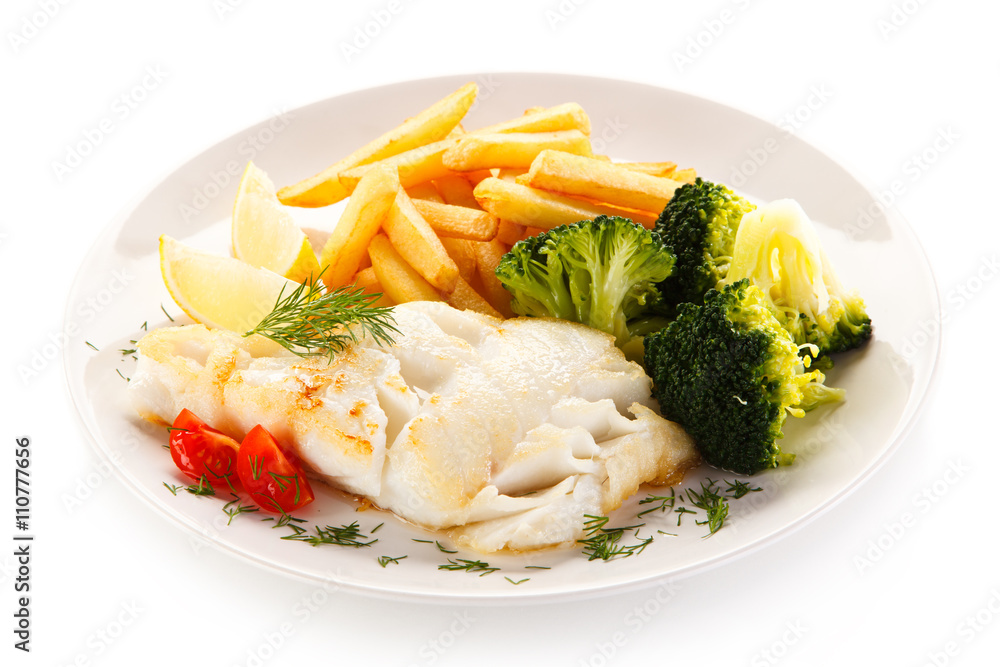Fish dish - fried fish fillet and vegetables Fish dish - fried fish fillet and vegetables