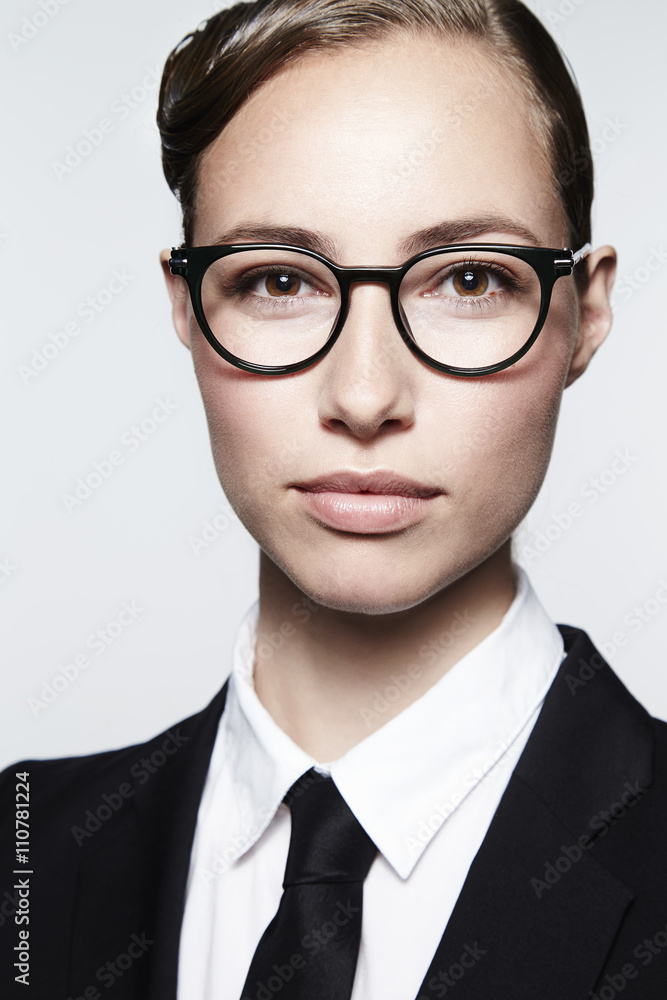 Businesswoman in spectacles, portrait