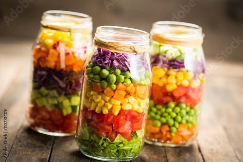 Fresh vegetable salad in a mason jar