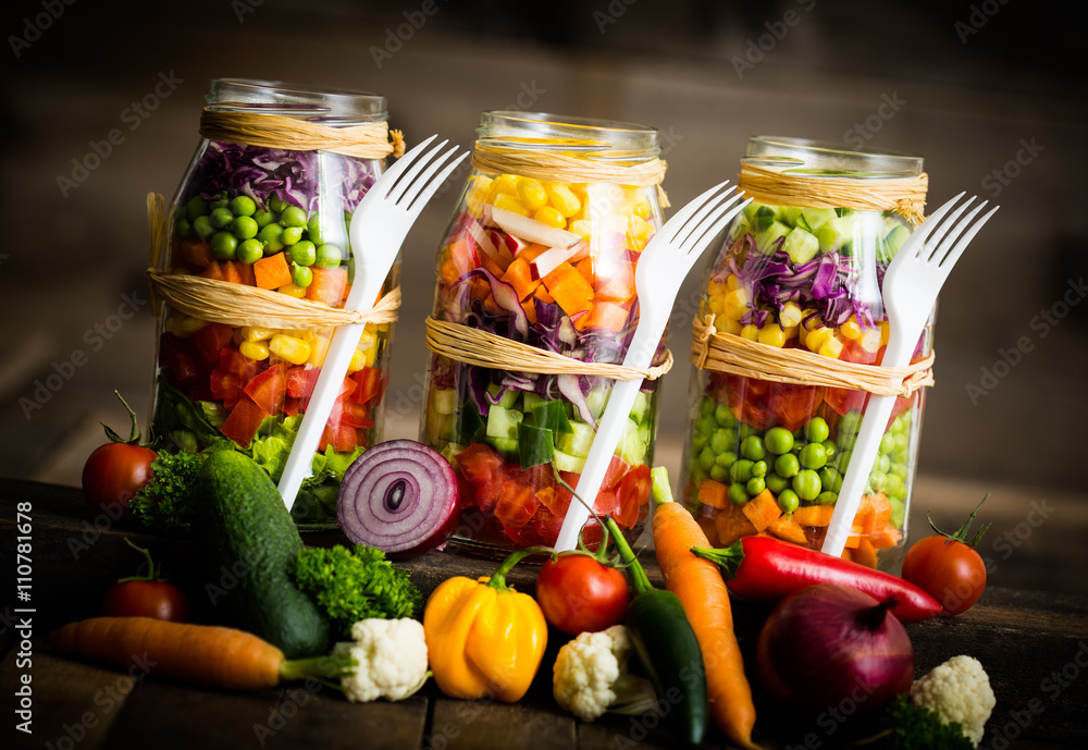 Fresh vegetable salad in a mason jar Fresh vegetable salad in a mason jar