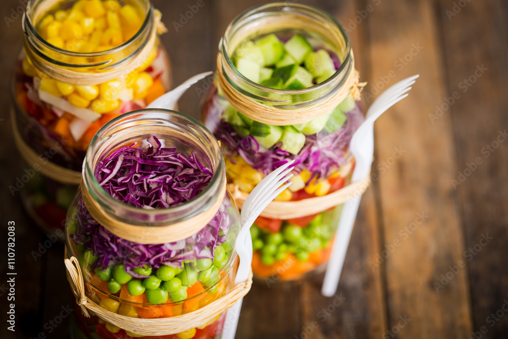 Fresh vegetable salad in a mason jar Fresh vegetable salad in a mason jar