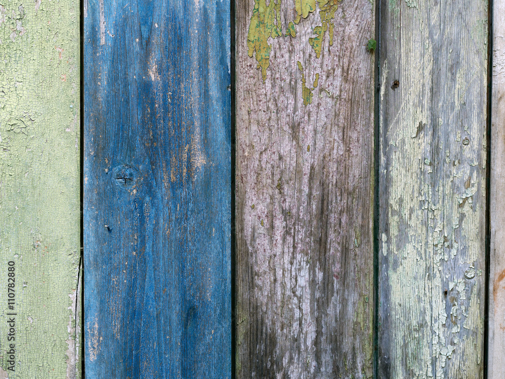 Boards farmhouse. Old boards, paint residues. Texture of wooden boards. Paint color - blue, green, gray, beige color
