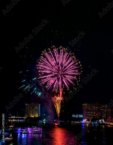 Fireworks / Colorful of fireworks on the river at night. © wimage72