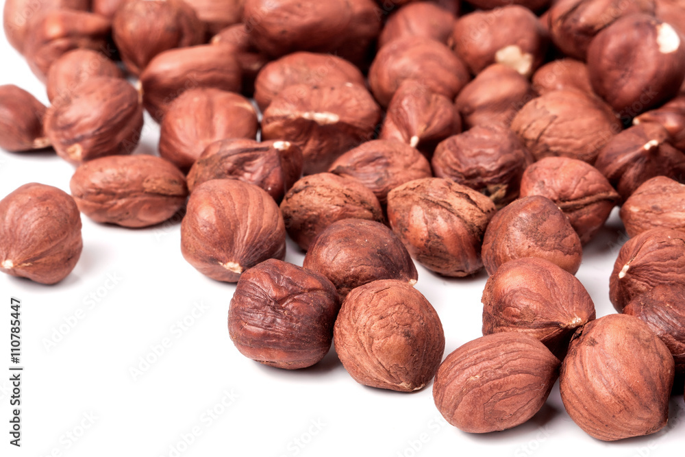 peeled hazelnuts isolated on white background macro peeled hazelnuts isolated on white background macro