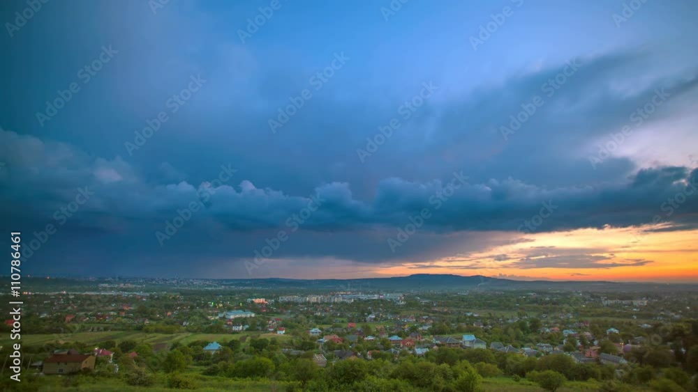 4 in 1! The flow of cloud over the evening city. Time lapse