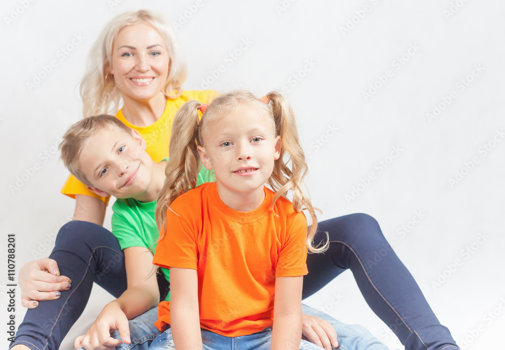 Happy family with beautiful mother and her children