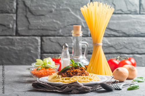 Spaghetti bolognese with ingredients