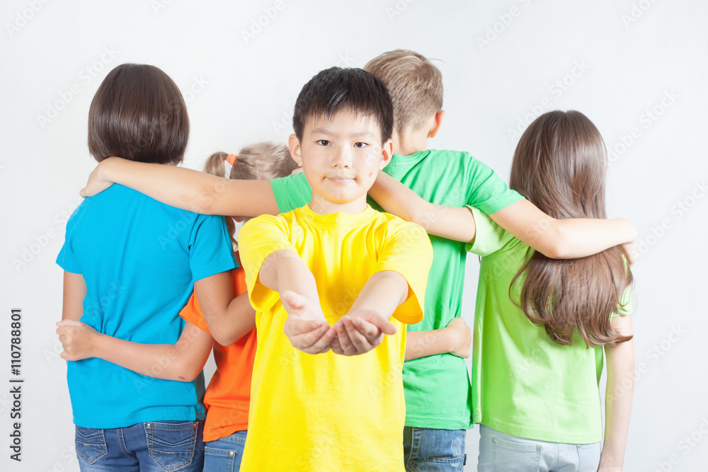 Group of friendly childrens like a team together Group of friendly childrens like a team together