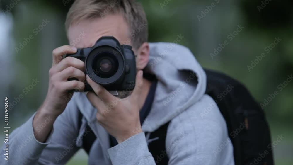 A Large Portrait Of A Man With A Camera That Shoots Photos A Large Portrait Of A Man With A Camera That Shoots Photos