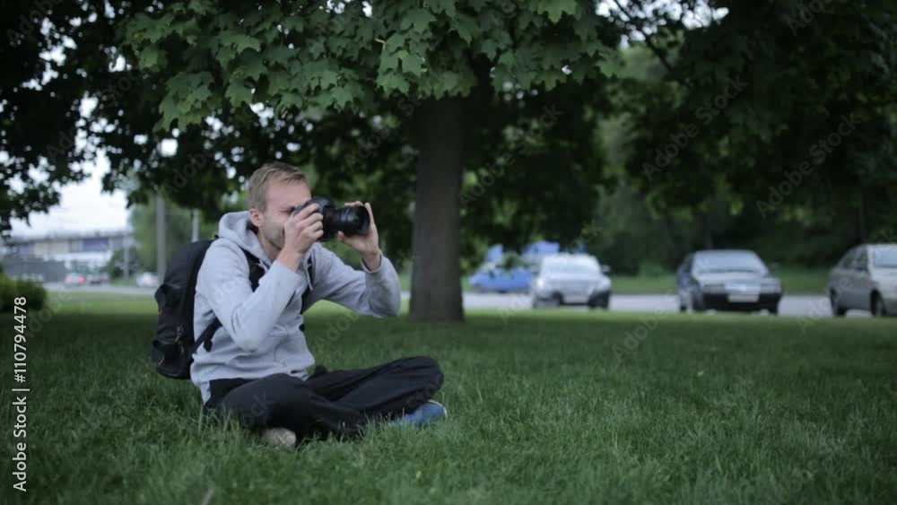 Aspiring Photographer Learns To Shoot At A Professional SLR Camera Aspiring Photographer Learns To Shoot At A Professional SLR Camera