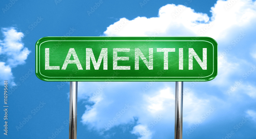Obraz premium lamentin vintage green road sign with highlights