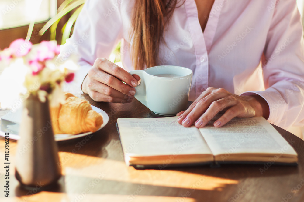 Woman's hands with cup of coffee Woman's hands with cup of coffee
