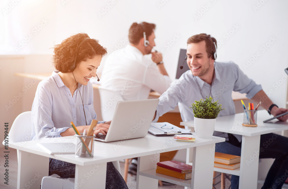 Positive colleagues working in the office Positive colleagues working in the office