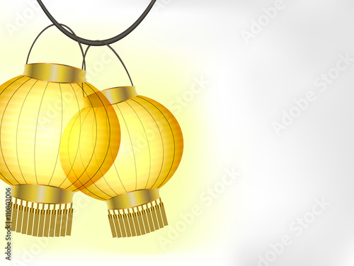 Glowing yellow paper lanterns on white background