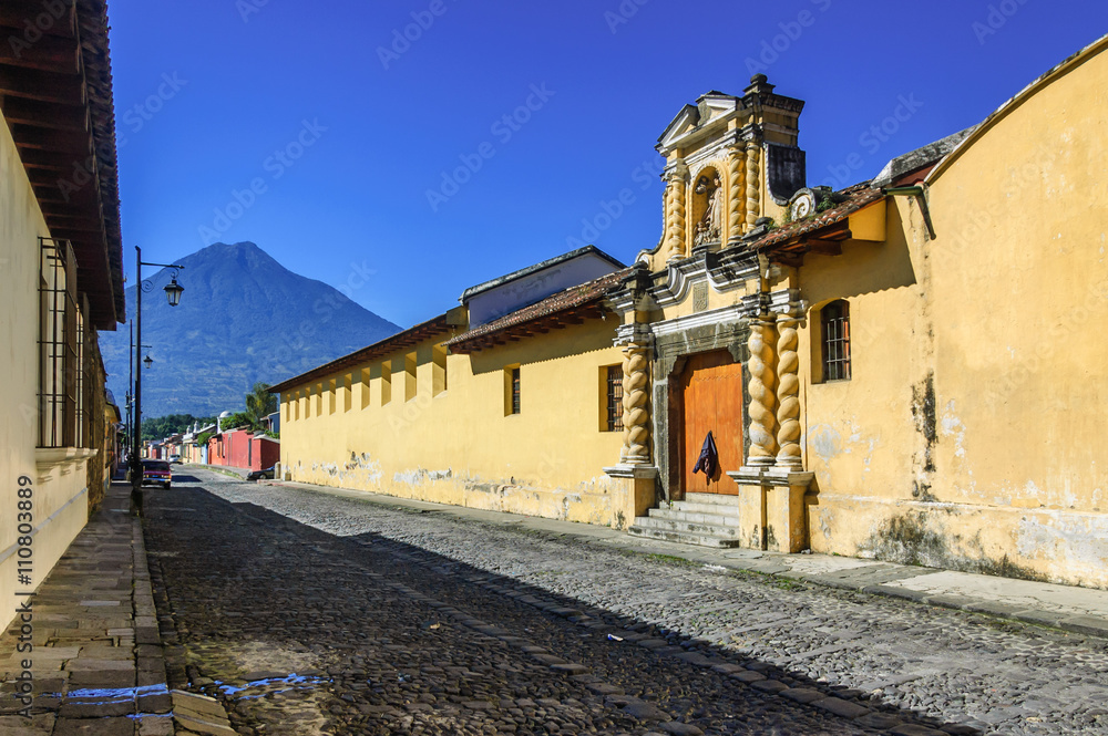 Agua volcano & cobblestone street, Antigua, Guatemala
