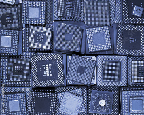 Obraz na płótnie Many old CPU chips and obsolete computer processors as background