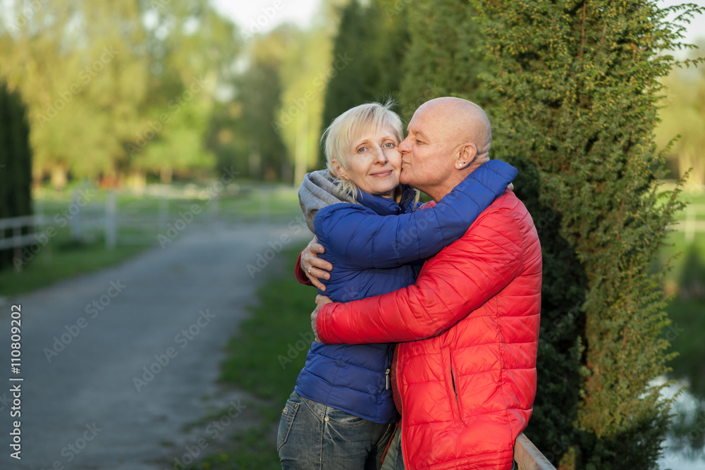 happy seniors couple embrace and smile; happy seniors couple embrace and smile;